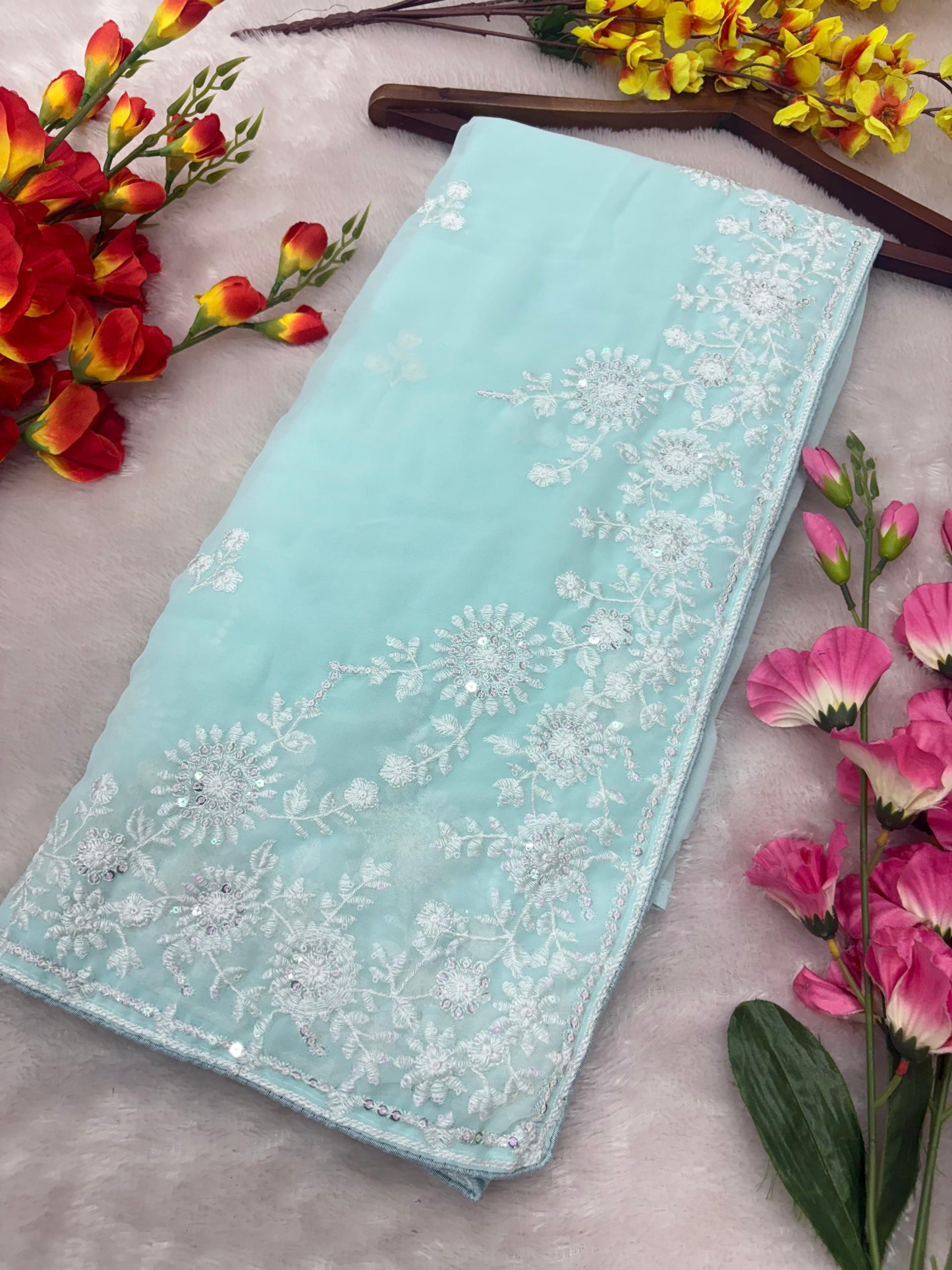 Premium Georgette Saree Embellished With Thread Embroidery And Beautiful Sequins Work